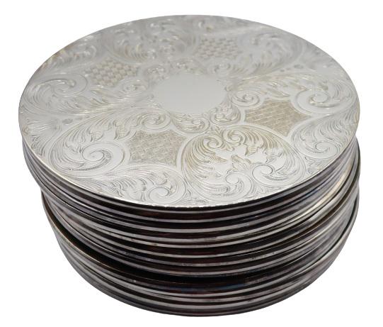 (15) Silver Plated Hot Plate Trivet: Silver plated hot plate trivet engraved decoration and felt bottom.Size: 8 1/2 in. diameterPlease note that all sales are final. No refunds will be given under any circumstances.