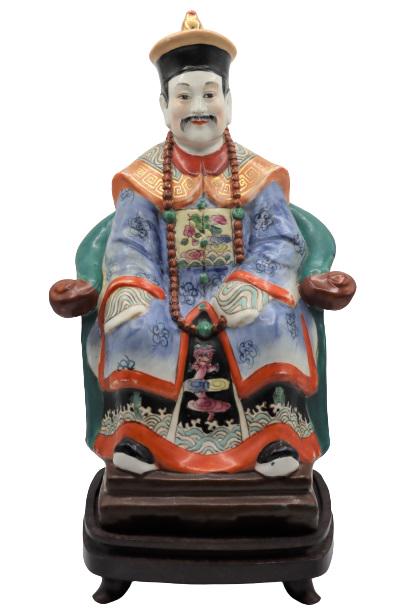 Polychrome Chinese Porcelain Seated Figure: Elegant statue of a seated Chinese nobleman or emperor figure, he wears traditional garb and is seated on a throne-like chair. Mark on bottom.Size: 16 1/2 x 9 x 6 in. Please note that all sales are fi