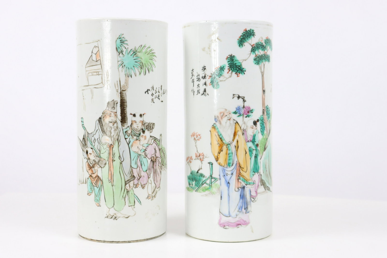 Pr. Chinese Hand Painted Scene Brush Pots: Pair of Chinese hand painted brush pots with figural exterior scenes.Size of each: 10 x 5 in.Please note that all sales are final. No refunds will be given under any circumstances.