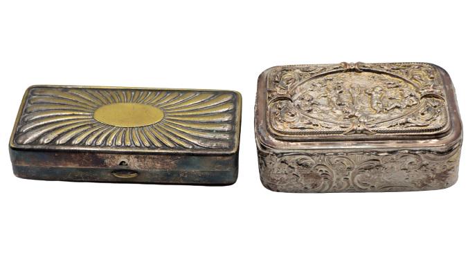 (2) Hinged Boxes: Two decorative boxes, appear to be silver, with marks. Sizes: 3 1/2 x 2 1/2 in. and 4 x 2 in.Please note that all sales are final. No refunds will be given under any circumstances.
