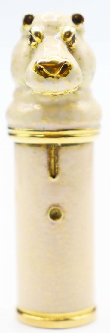 Rare Gucci 18K Gold Enameled Hippo Atomizer: This is a rare 18K and beige enameled Hippo face Atomizer with ruby inserts in the eyes. Made by Gucci. Includes Italian Gucci leather protective sleeveSize: 2 3/4 x 1 inPlease note that all sales are