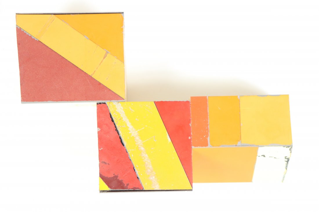 Ted Larson (B. 1964) Salvaged Steel Sculpture: Geometric blocks with salvaged steel plates layered over, each metal tile is painted, wall hanging art.Dimensions: 9 x 6 x 2 in.Please note that all sales are final. No refunds will be given under any