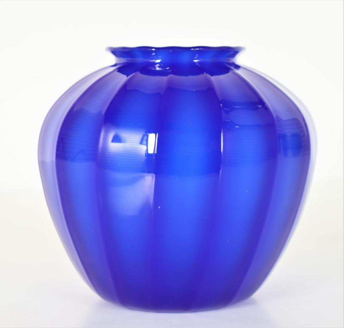 Steuben Cobalt Ribbed Art Glass Vase: Size: 7 x 7 x 6 in.Provenance: Estate of Dr. Arnold Werschky in Sausalito, California.