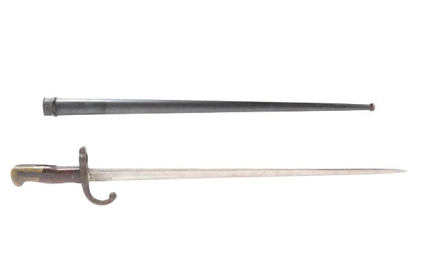 French Bayonet and Scabbard 1877 St. Etienne Model: Beautiful French bayonet and scabbard with inscription on the spine of the blade which reads “Mre d’Armes de St. Etienne Janvier 1877”, so the bayonet was manufactured for the French government 