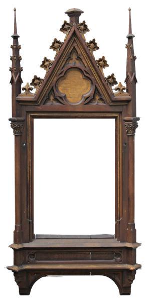 Antique Carved Wooden Hymn Board Frame: Gothic elements include columns and spires, this frame was likely used in a church to list the hymns sung during the service.Overall: 73 1/2 x 33 1/2 in. Sight: 29 3/4 x 20 1/2 in.