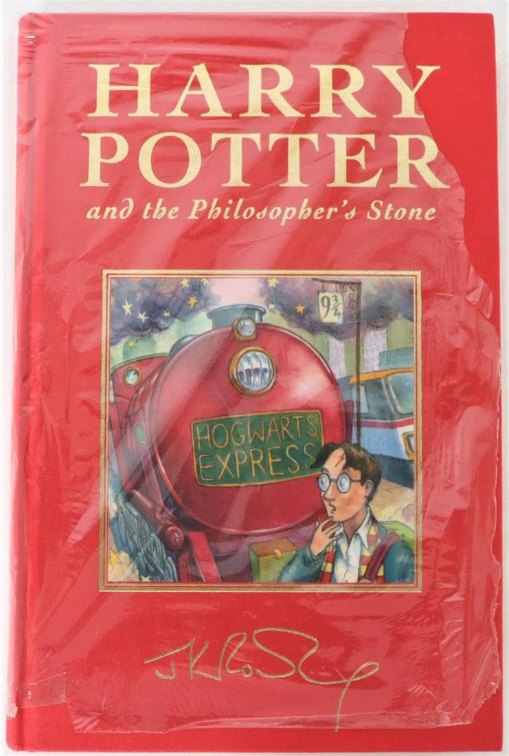 Harry Potter and the Philosopher’s Stone 1999: Harry Potter and the Philosopher’s Stone 1999 by J K Rowling, Deluxe British Edition, only 4000 printed, the plastic seal has been opened, but the plastic retains the bar code information on the bac