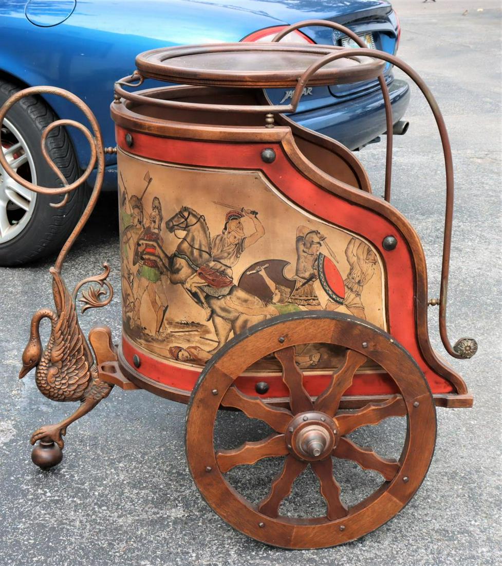 Wood & Metal "Chariot" Bar Cart: Wooden and metal bar cart, chariot shape with painted scenes, and Medusa-head relief motif. Provenance: Kellogg Mansion, Dunedin, Florida. Built in 1925.Size: 39 x 29 x 38 in. Please contact Nic at In