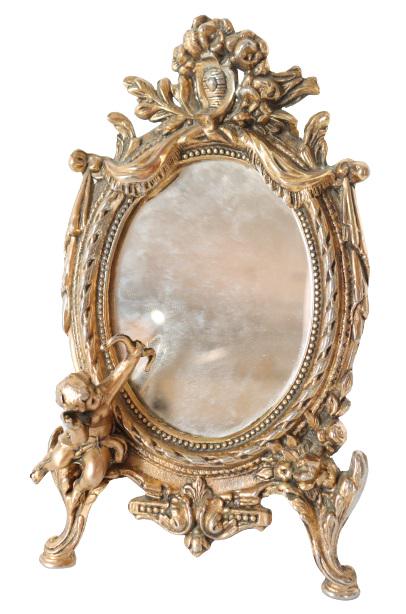 Gilt Metal Ormolu Vanity Mirror: Gilt Metal Ormolu Vanity Mirror, intricate detailing.Size: 12 x 7 1/2 in. Please contact Nic at Info@premiershipment.com for an estimated shipping quote prior to bidding. Please note that all items ar