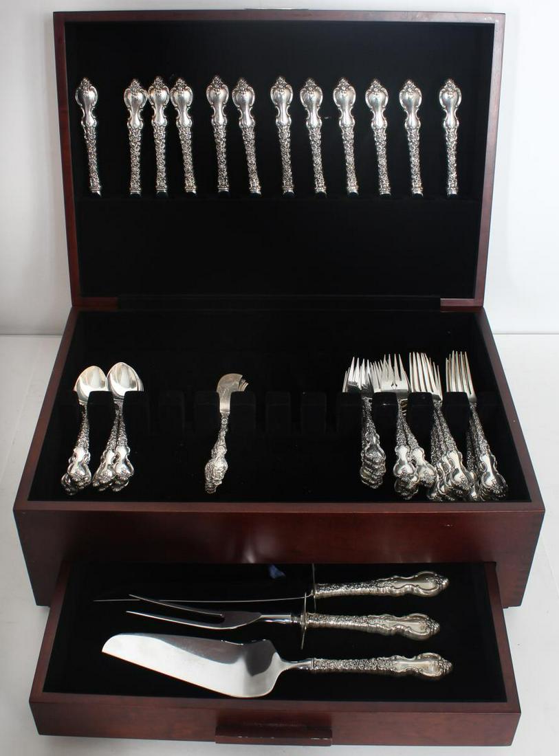 International Sterling Silver Flatware Set, 73 OZT: International Sterling Silver Flatware Set. 51 pcs. Total Approx weight including knives at half oz: 73 OZTApprox weight not inlcuding knives: 66.735 OZT. Size of Box: 17 1/2 x 7 1/2 in.12 dinner fork