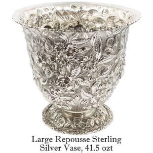 Large Repousse Sterling Silver Vase, 41.5 ozt: Large Repousse Sterling Silver Vase, 1905-1928. Herr-Schofield Co. of Baltimore, Maryland. 41.5 oztSize: 9 1/2 x 9 1/2 x 8 3/4 in.