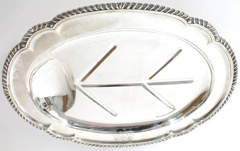 Monumental English Sterling Silver Tray 103 ozt: English Sterling Silver Tray 103 oztMaker Mark CBCharles Boyton II London 1863Size: 23 1/2 x 17 x 2 3/4Following Lot will consist of same Royal Crest Armorial Associated with this platter. The two