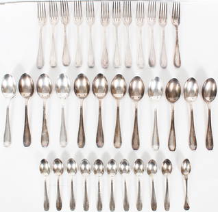 (35) Pc Continental Silver Flatware, 83.5 OZT: (35) Pc Continental Silver Flatware, 83.5 OZT. Includes 12 forks, 12 spoons, and 11 smaller spoons. Total Weight: 83.55 OZT. Size of Largest: 8 1/4 x 1 3/4 x 7/8 in.