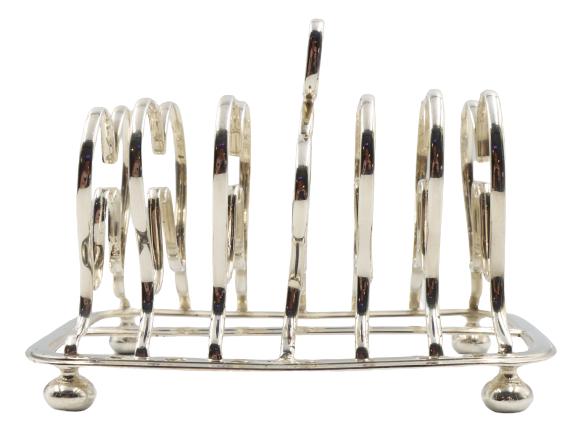 Scottish George IV Sterling Toast Rack, 9.6 ozt: Scottish George IV Sterling Toast Rack with HandleApprox 9.63 oztSize: 4 x 6 1/4 x 5 in.