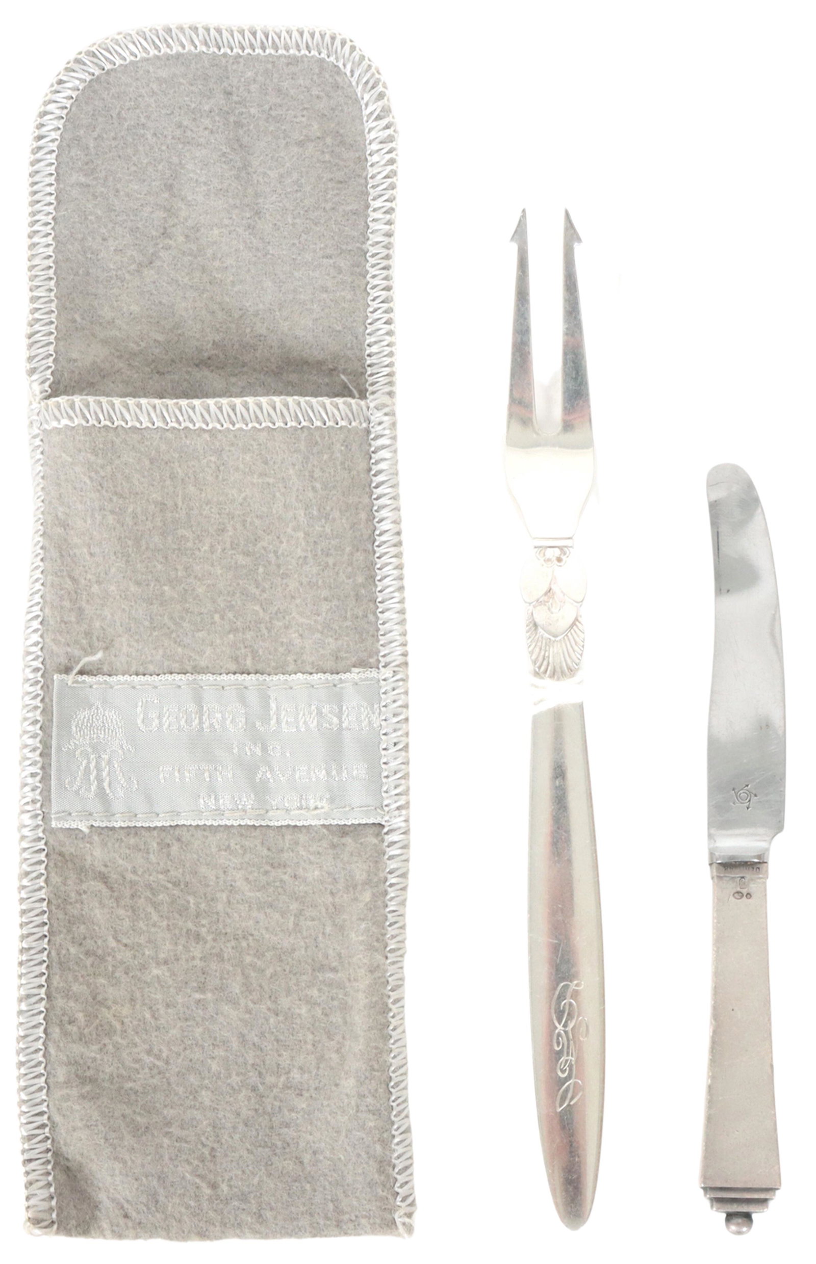 (2) Georg Jensen Denmark Sterling Utensils: (2) Georg Jensen Denmark Sterling UtensilsLemon Fork, Caviar Spreader Size of Fork: 6 1/8 in. Bag#21