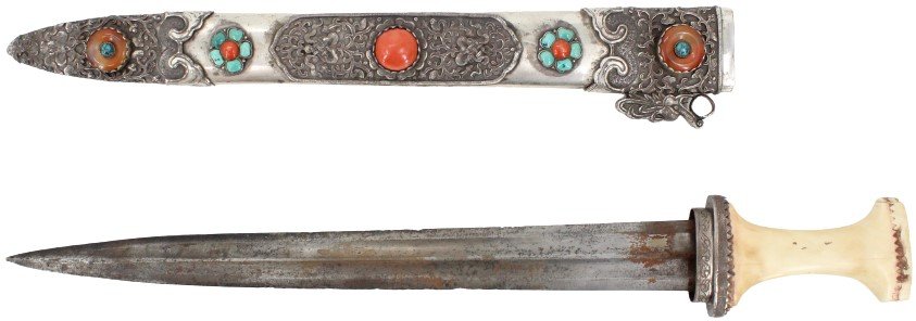 Nepalese or Tibetan Dagger and Silver Sheath: Nepalese or Tibetan Dagger and Silver Sheath. Antique with Carved Bone Handle. Turquoise and Coral Inlays. Size: 17 7/8 x 3 x 3/4 #1585