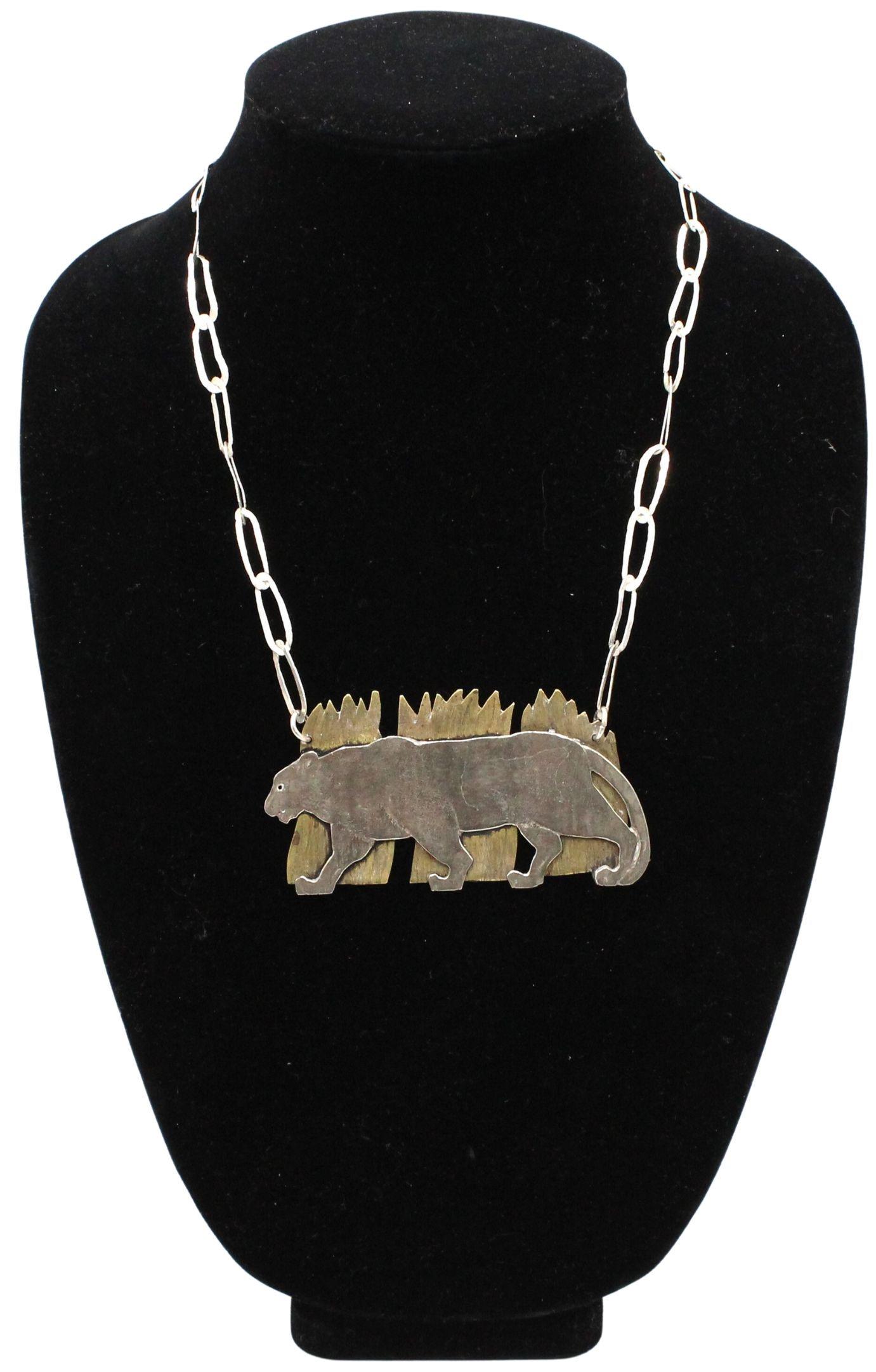 Silver & Mixed Metal Panther Necklace: Silver & Mixed Metal Panther Necklace. Silver chain ,brass, silver panther. Size: 21 in. Hangs: 10 1/4 in. Pendant: 3 5/8 x 2 in. #2786