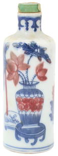 Early 19th C Chinese Porcelain Snuff Bottle: Early 19th Century Chinese Porcelain Snuff Bottle. Underglazed blue and iron red. Early 19th Century. Hand Painted Porcelain. The bottle is in fair condition with signs of discoloration on the