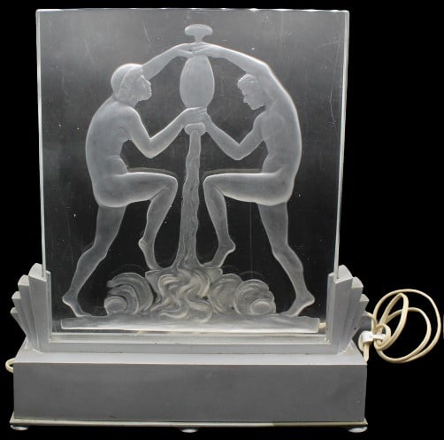 Rare Art Deco Steuben Glass Luminaire Panel 1920s: Art Deco Steuben Crystal Luminaire Luminor of Man and Woman. Minor Flea bite to the top of the glass (Image 12). Line Drawing # 8461 in "The Glass of Frederick Carder" Unsigned. Holder Lights Up and i
