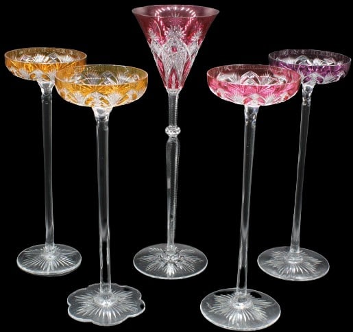 (5) Baccarat Overlay Crystal Toasting Glasses: (5) Baccarat Overlay Crystal Toasting Glasses Clear crystal glass overlaid in colored crystal with high stems and diamond & palm leaf decorations. 4 matching shallow bowls are 1 red, 1 purple, 2 gold.