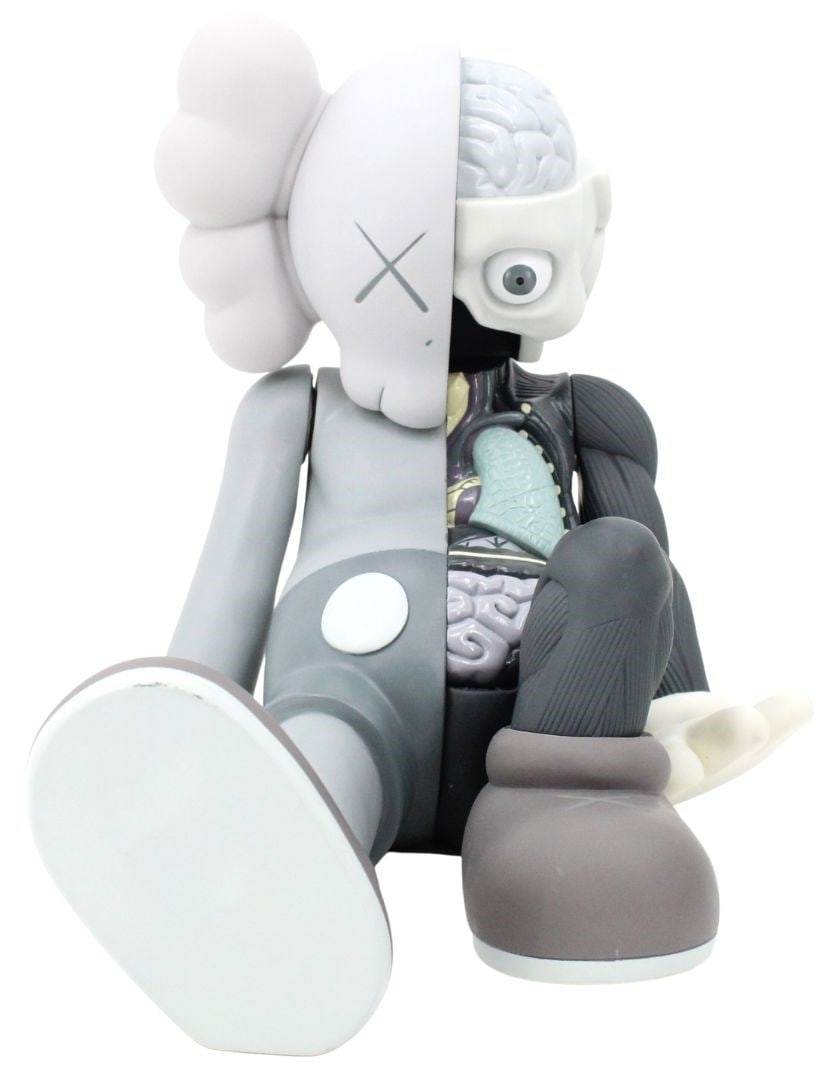 Kaws & Original Fake Dissected Figurine: Kaws & Original Fake Dissected Figurine .Resting Place Figure. Marked on underside of right foot. Grey vinyl Resting Place Dissected Companion figurine is a 2013 collaboration between KAWS' Original F