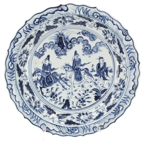 20C Chinese Porcelain Blue & White Charger: 20c Chinese Porcelain Blue & White Charger. Image Depicts 3 travelers on horseback. Edge Mouth Plate. Chinese Symbols Calligraphy on Rim of Plate. Size: 15 1/2 x 15 1/2 x 2 in. #1954