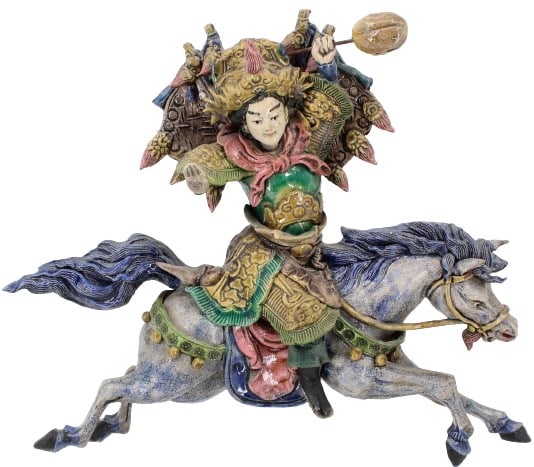 Chinese Terracotta Warrior Roof Tile: Chinese Terracotta Warrior Roof Tile. Crackling glaze. Warrior in armor on a blue horse. Attached to an acrylic stand. Intricate details throughout. Small crack on horse near rider on front. Size: 16