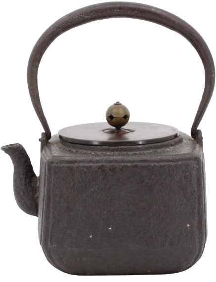 Japanese Cast Iron Teapot: Japanese Cast Iron Teapot. With flat lid and conical finial. Short spout, square form. Size: 6 1/2 x 4 1/2 x 8 in. #1672