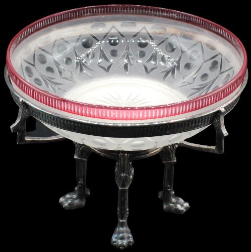 Cranberry & Engraved Glass Silverplate Centerpiece: Cranberry edged frosted engraved glass bowl supported by 3 ornate silver plate legs with claw feet. Size: 9 3/4 x 9 3/4 x 7 1/2 in. #1184