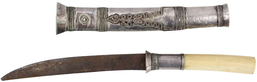 Antique Burmese Dha Dagger: Antique Burmese Dha Dagger.Silver scabbard and hilt mount. Ornate design and bands of filigree with patina commensurate with age.As Is: Knife tip broken off. Rusty blade. Size: 10 5/8 x 2 x 3/4 in. #1