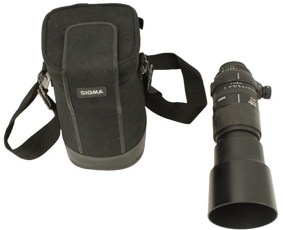 Sigma Telephoto 200m Lens: Sigma Telephoto 200m Lens. 135-400mm f/4.5-5.6 APO. Size of Bag without Strap: 6 1/4 x 6 x 10 1/4 in. #1602Location B3