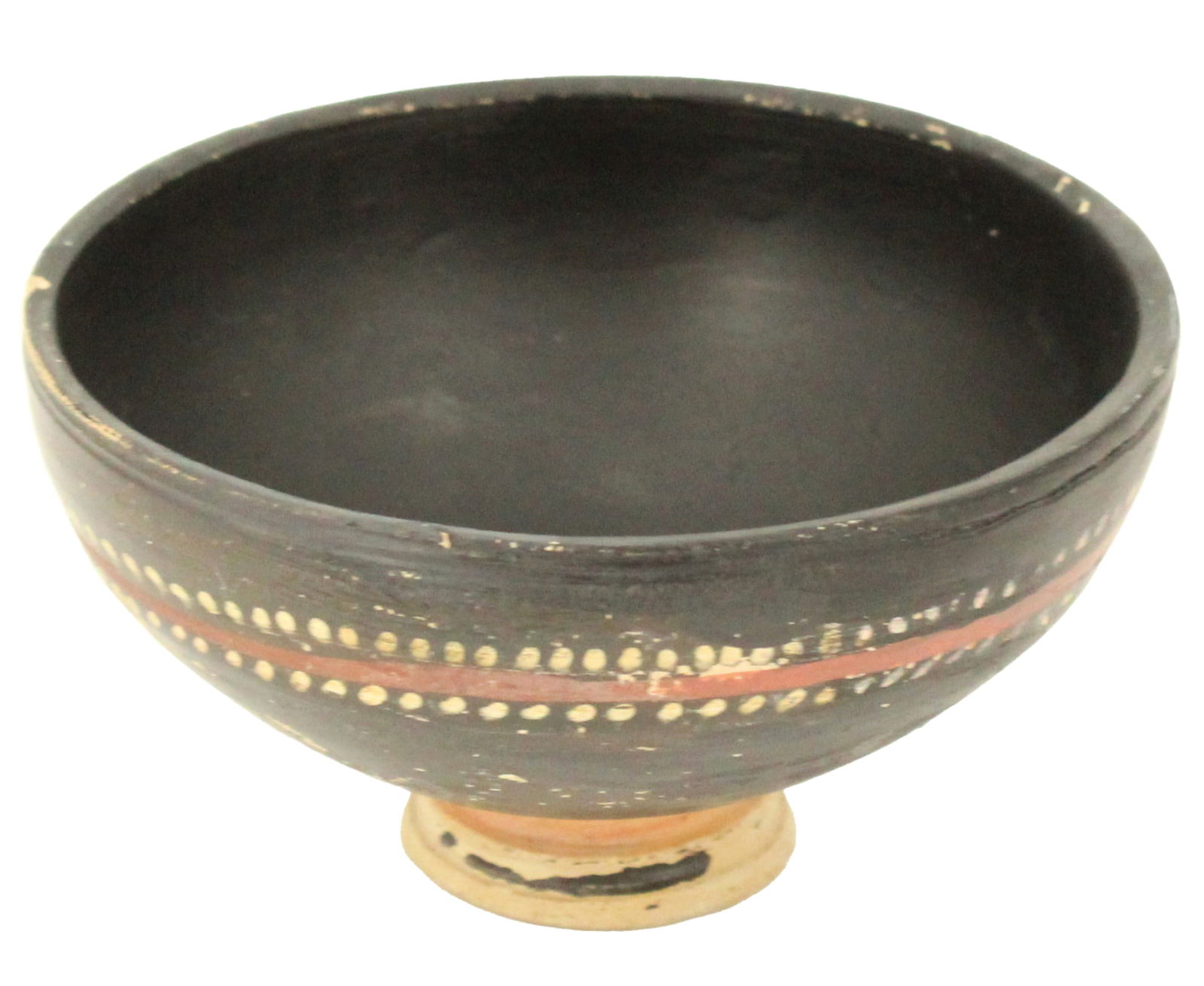 Greek Gnathian Blackware Cup: Greek Gnathian Blackware Cup. Ca. 350 BC.A pottery cup, crafted with precision and care by the skilled hands of ancient artisans. This cup boasts a hemispherical-shaped bowl, rising from a short, balu