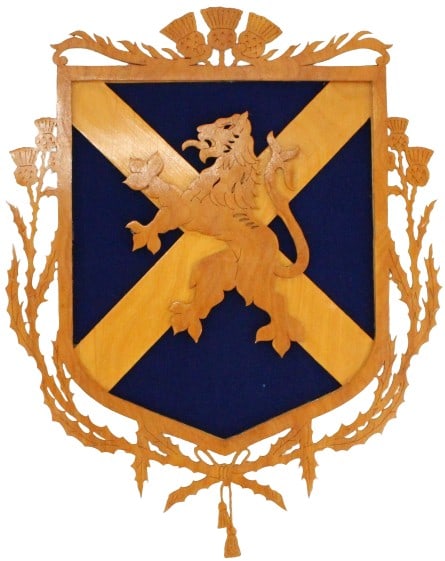 Scottish Lion Carved Wood Coat of Arms: Scottish Lion Carved Wood Coat of Arms. The crest is adorned with a thistle pattern synonymous with Scottish Royalty. Size: 14 1/4 x 18 x 1/2 in. #1291 Location B3