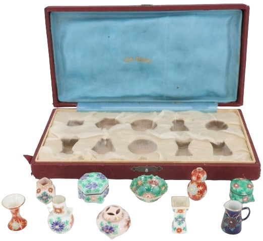 Diminutive Collection of Japanese Signed Porcelain: Diminutive Collection of Japanese Signed Porcelain. In original fitted box. Box Size: 8 x 4 1/4 x 1 1/2 in. Largest: 3/4 x 3/4 x 1 1/4 in. #5257