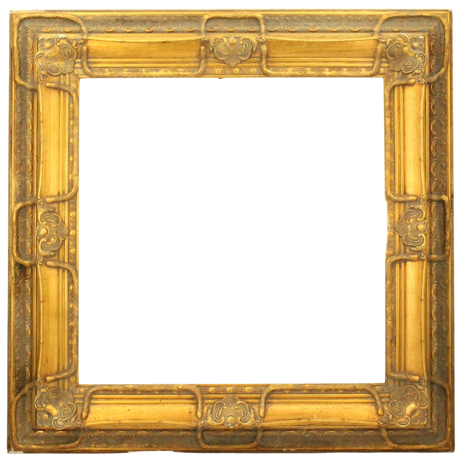 20th c. Ornate Gilt Frame: 20th c. Ornate Gilt Frame. This square frame has decorative, scrolled corners and matching designs at the cardinal directions. A rope design wraps around each design and then weaves down to the border