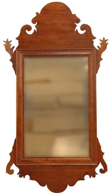 18th Century Chippendale Wall Mirror: 18th Century wood framed Chippendale wall mirror.Condition: Silvering at mirror edges and corners. Size: 26 1/4 x 14 3/4 in. Mirror Sight Size: 13 3/4 x 8 3/4 in. #19 #1677 . Thomas Chippendale was bo