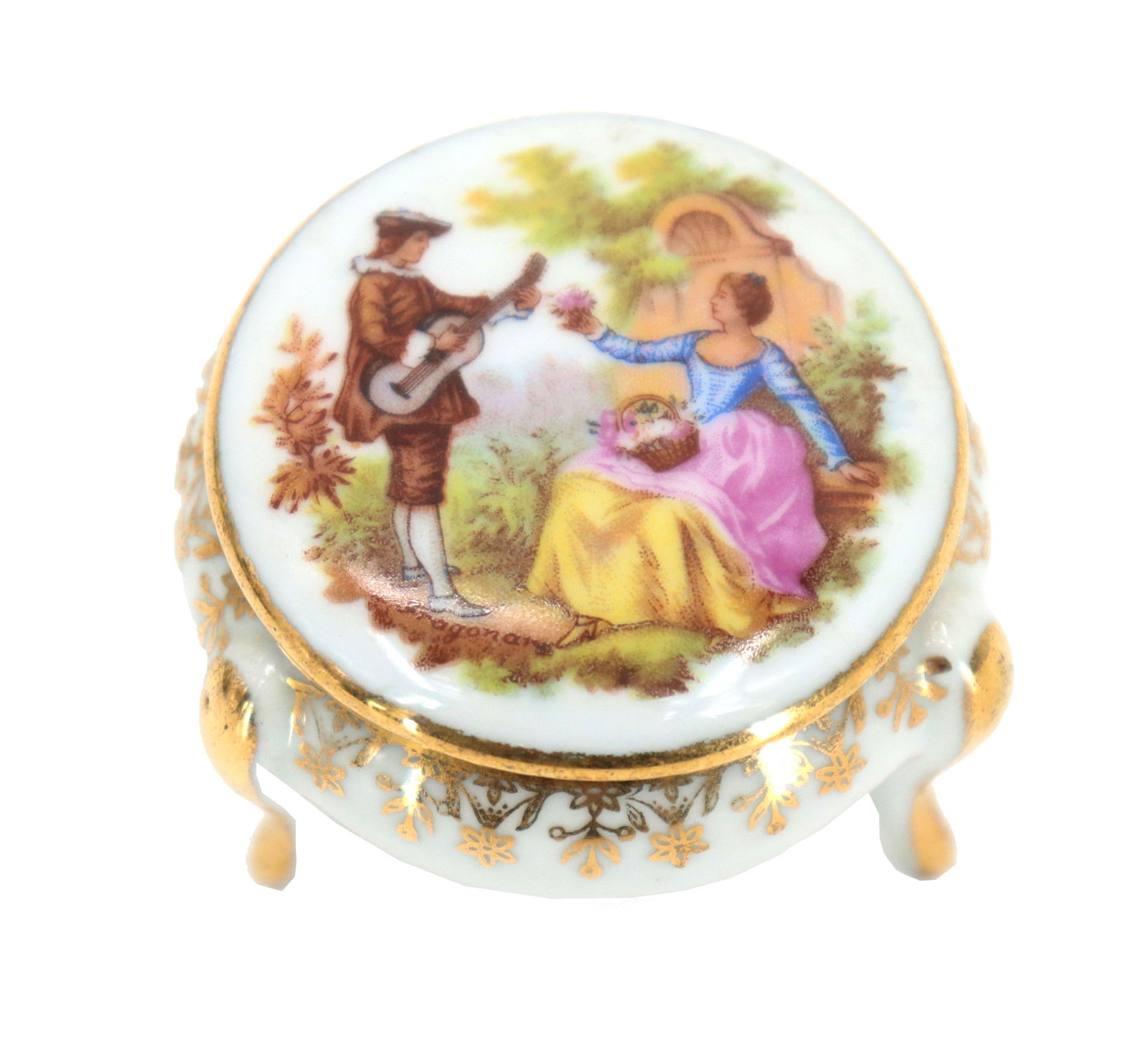 Limoges Three-Legged Lidded Trinket Box: Delicately painted Limoges porcelain lidded trinket box, with gilt painted accents. Lid with painting of man and woman courting one another, titled "Serenade".Size: 1 3/4 x 2 1/2 in. #5534