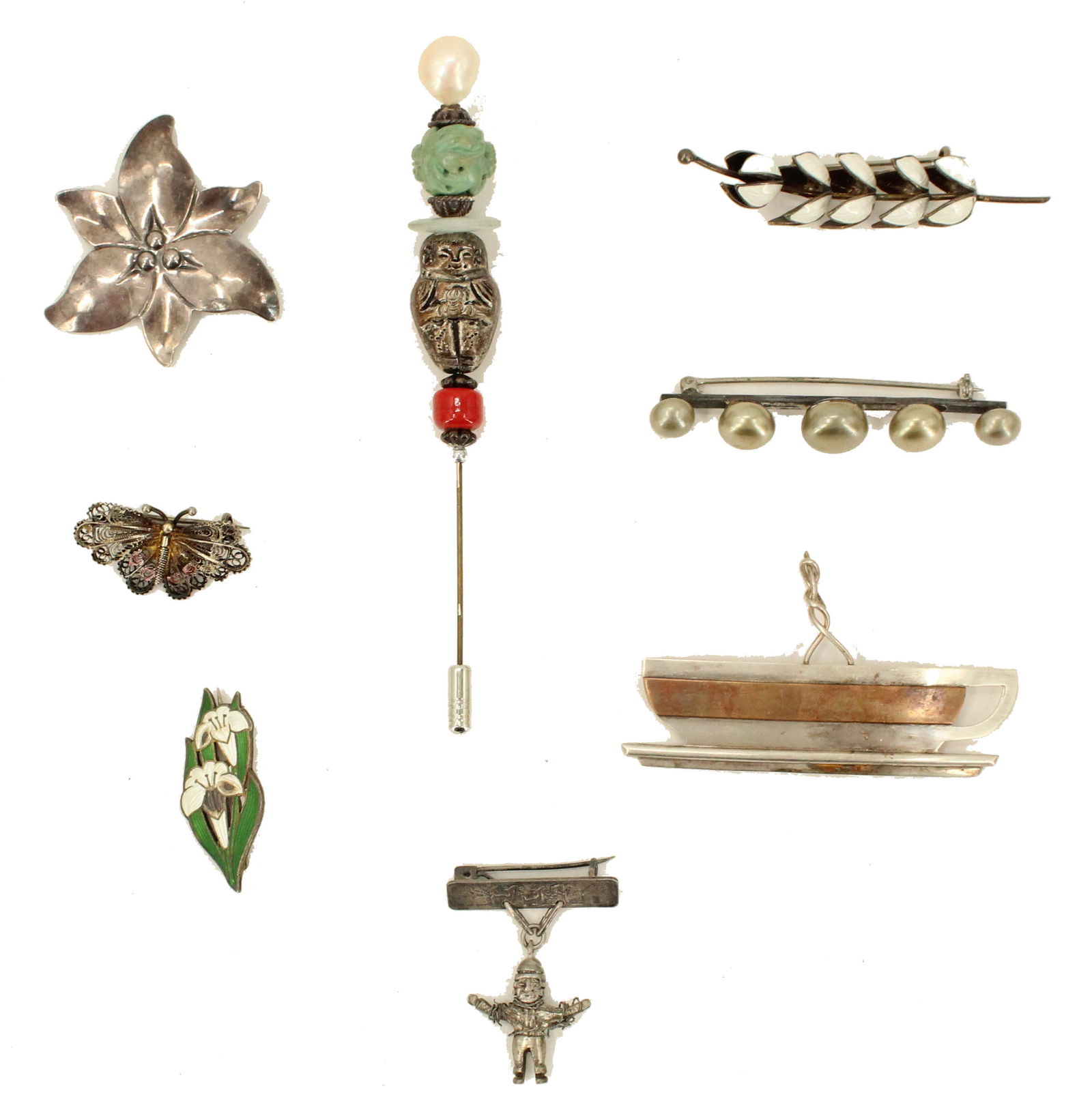 (8) Sterling Silver Pin Brooches - 1.645 ozt.: Lot consists of: Silver stick pin with silver figure, carved green stone, red stone bead, and a faux pearl. Sterling silver smooth Monaco Designs brooch. Depicts a coffee cup. Marked on back. Sterling