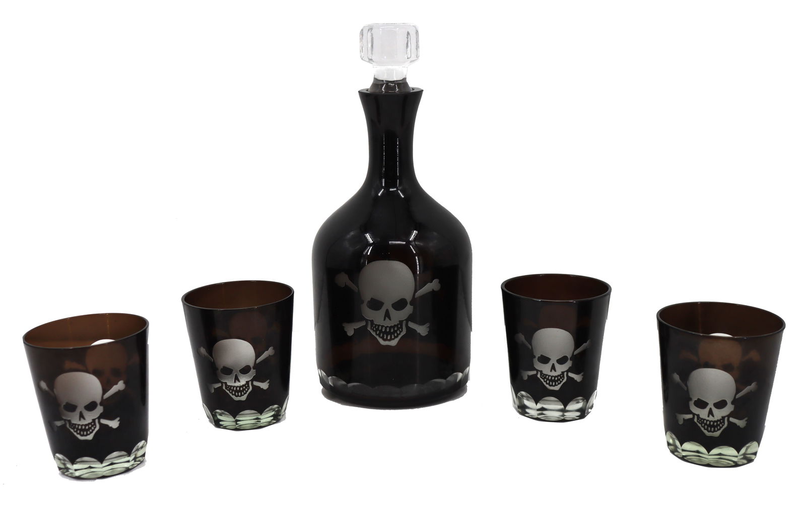 Decanter and 4 Matching High Ball Glasses Pirate / Skull And Cross Bones: Decanter and 4 Matching High Ball Glasses Pirate /Skull And Cross Bones. A cut smoked glass decanter and Four highball glasses. This Skeleton Pattern creates a ghoulish treat for Halloween, Disn