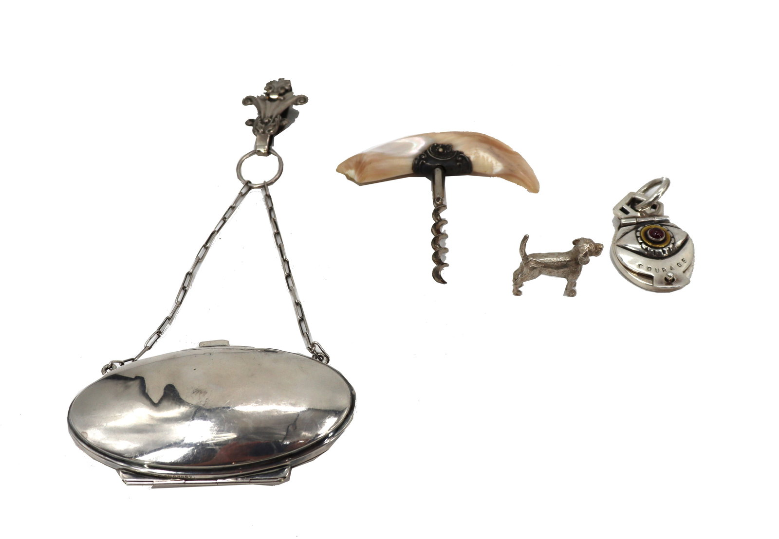 Group of Variety of Percentage Silver Items: Group of Variety of Percentage Silver Items. Horn Wine opener has a sterling rim. Dog has markings on his side. Change Purse has English Sterling Markings Locket is Sterling Marked. Larges