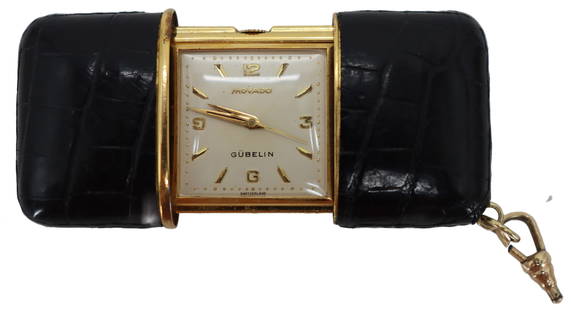 Vintage Movado Gubelin Sliding Self Winding Travel Clock with Crocodile Case: Vintage Movado Gubelin Sliding Self Winding Travel Clock with Crocodile Case. Self winds when you slide open and close the case. Serial number 1263 748M is engraved on the back of the case, along with