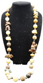 Handcrafted Sterling Necklace with a Mixture of Bone, Semiprecious Stones, and Jade Beads