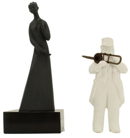 2 Ceramic Figurines - "Sympathy" by Royal Doulton and "Trumpeter" by Department 56