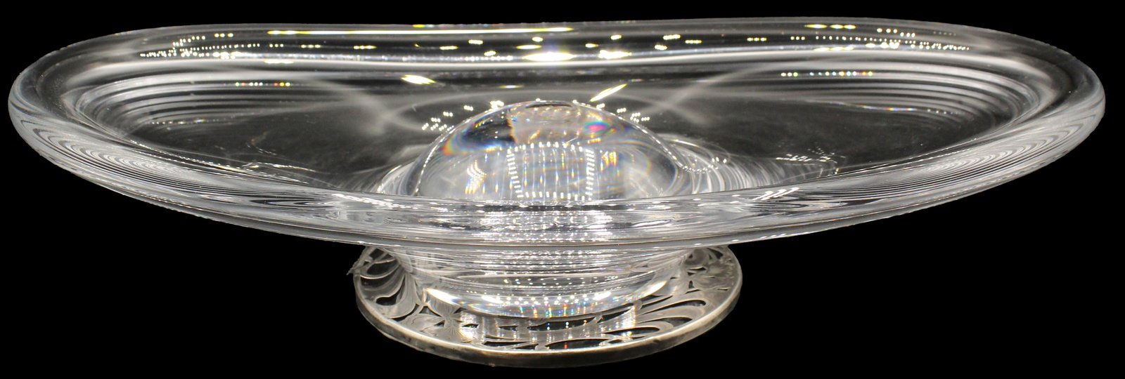 Crystal Serving Tray and Vintage Silver Overlay Glass Trivet: Crystal Serving Tray and Vintage Silver Overlay Glass Trivet. The silver overlay is ornately carved with vine-like shapes, and the tray has a bulb-like middle stand which sits upon the trivet. L
