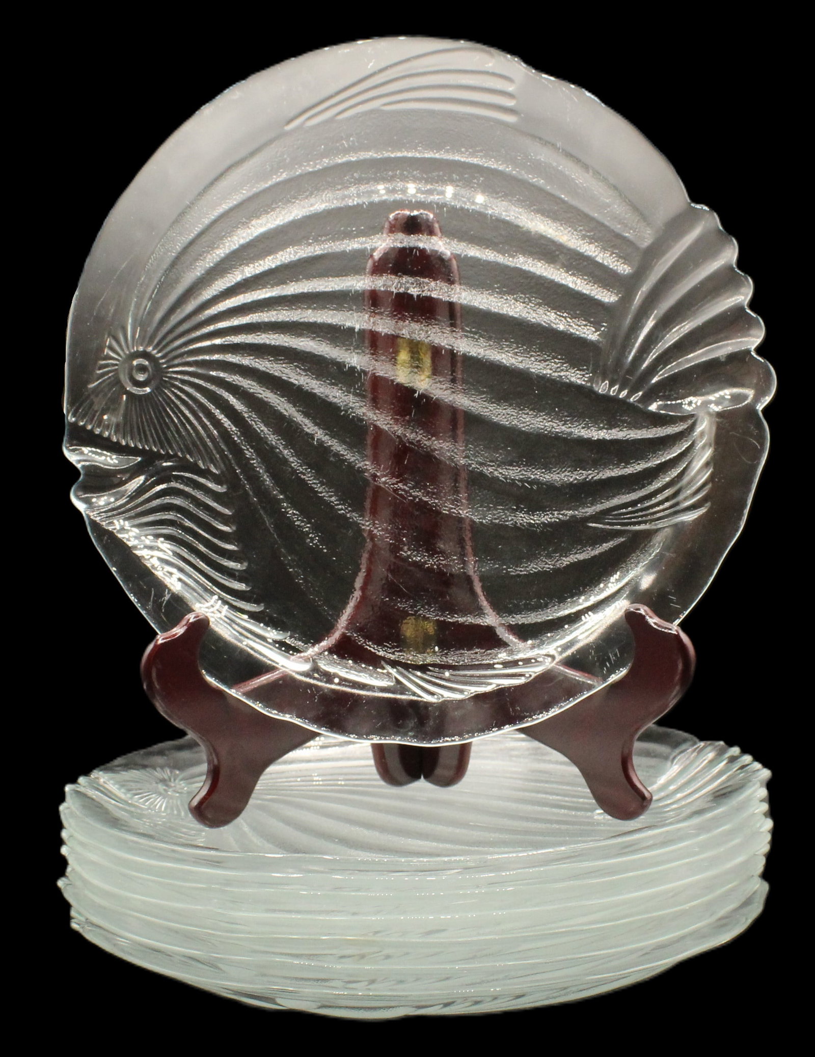 8 Fish Shaped Pressed Glass Platters: 8 Fish Shaped Pressed Glass Platters. Fish design features a detailed head, fins, and scales. Lines of the fish are raised and create a textured effect. Size: 11 x 11 in. #4323&