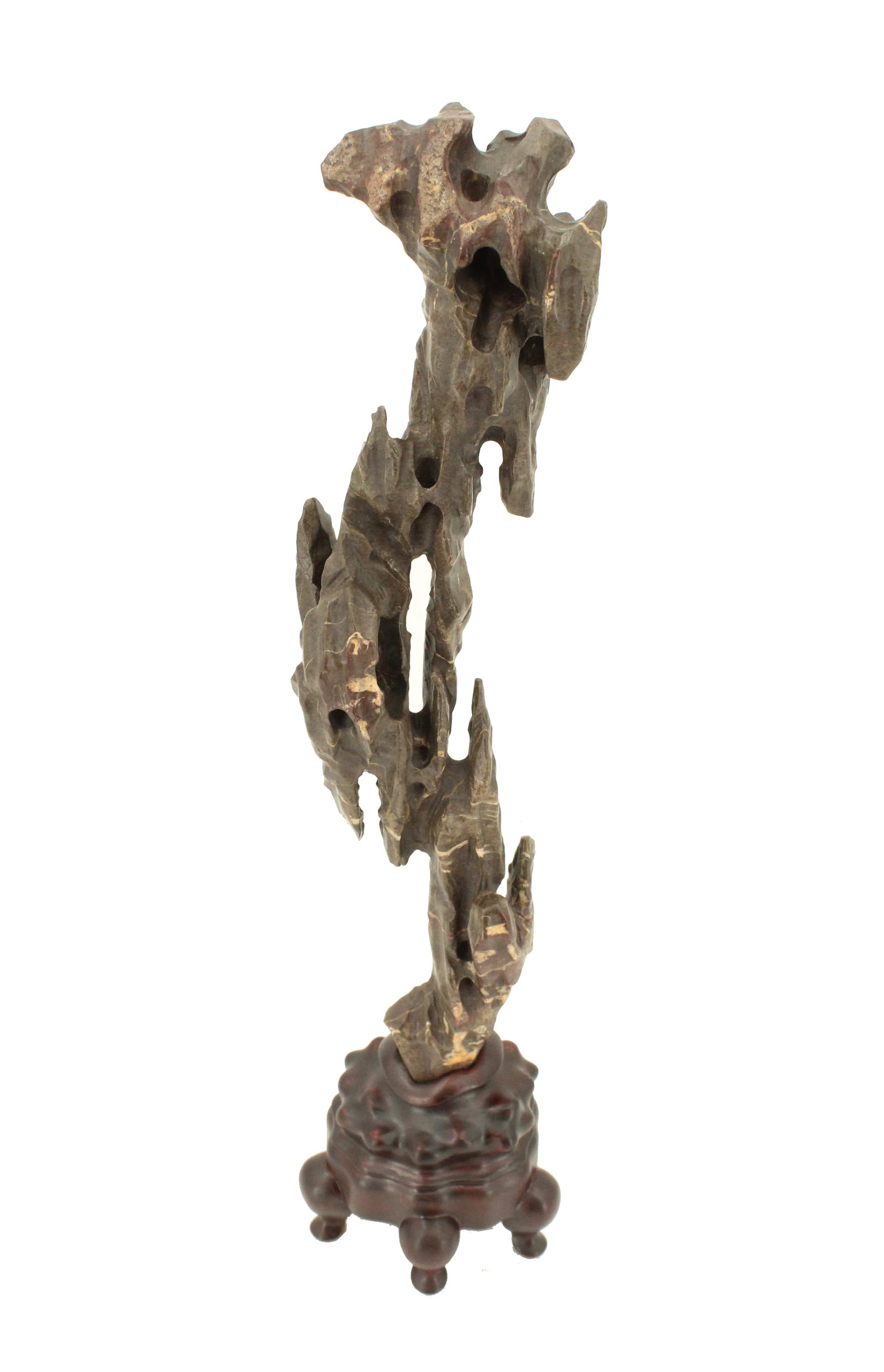 Chinese Scholar Rock: Chinese Scholar Rock. A thin vertical stone with many stone extrusions forming small stalactites up and down its form, creaint a unique and striking composition and visual texture. Attached to fitted 