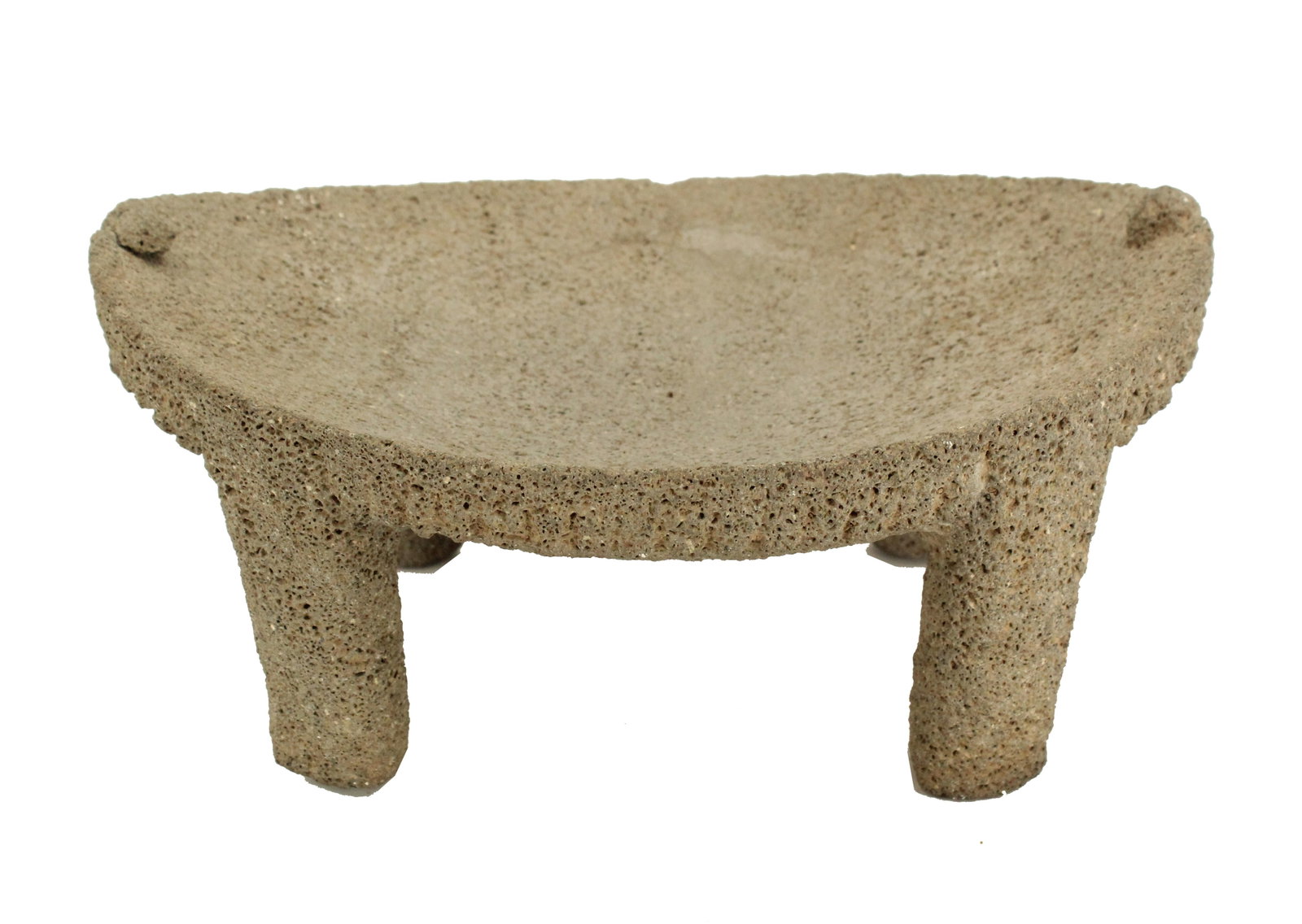 Carved Volcanic Rock Foot Stool: Carved Volcanic Rock Foot Stool. Four feet with a curved middle. Size: 12 1/2 x 11 x 6 in. #4691 . Volcanic rocks are formed from lava erupt