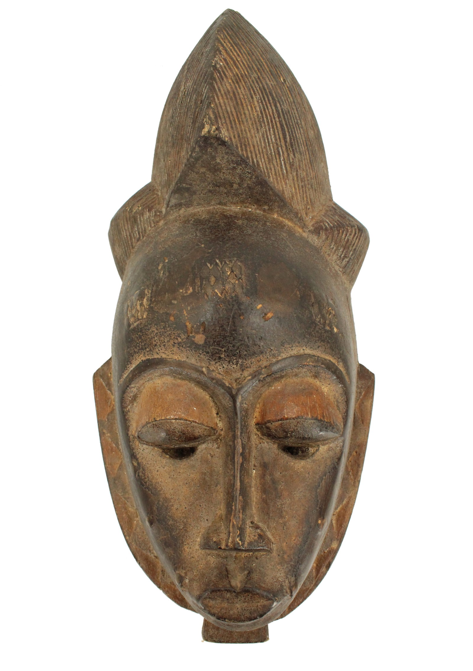 African Gabon Punu Wood Carved Tribal Mask: African Gabon Punu Wood Carved Tribal Mask. Shares similarities with the Baule tribal marks, but recognizable by its high hair and forehead carving. Size: 9 x 19 1/2 x 8 1/2 in. #4696 .&nb