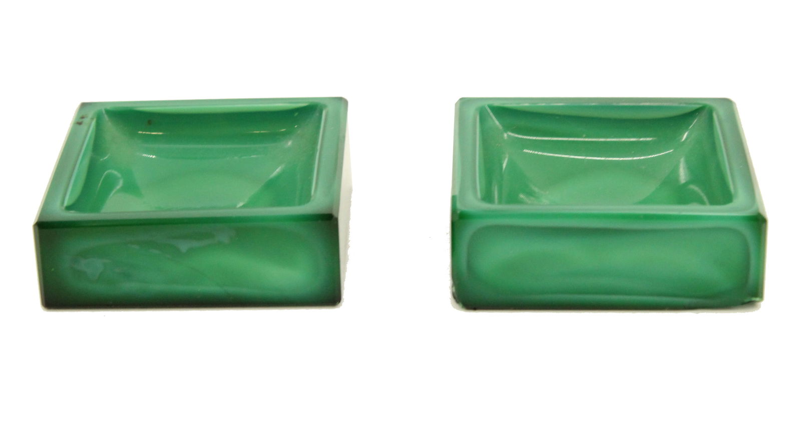 Pair of Malachite Glass Ring Dishes: Pair of Malachite Glass Ring Dishes . High style. Early 20th century. Size: 2 1/4 x 2 1/4 in. #4787 . Malachite is a copper carbonate hydroxide mineral, an opaque, green-banded monoclinic crystal whos