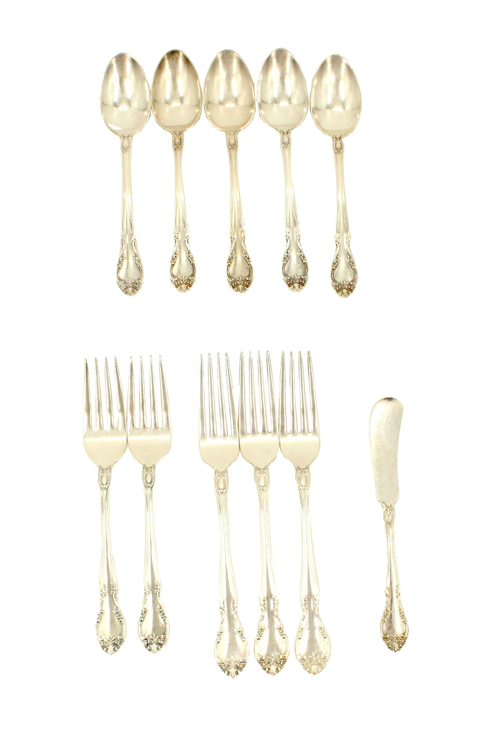 (11) American Gorham Silverplate Silverware: (11) American Gorham Silverplate Silverware. Marked on back. 5 teaspoons, 2 smaller forks, 3 dinner forks, and 1 butter spreader. Long slender handle with decorative floral design. S