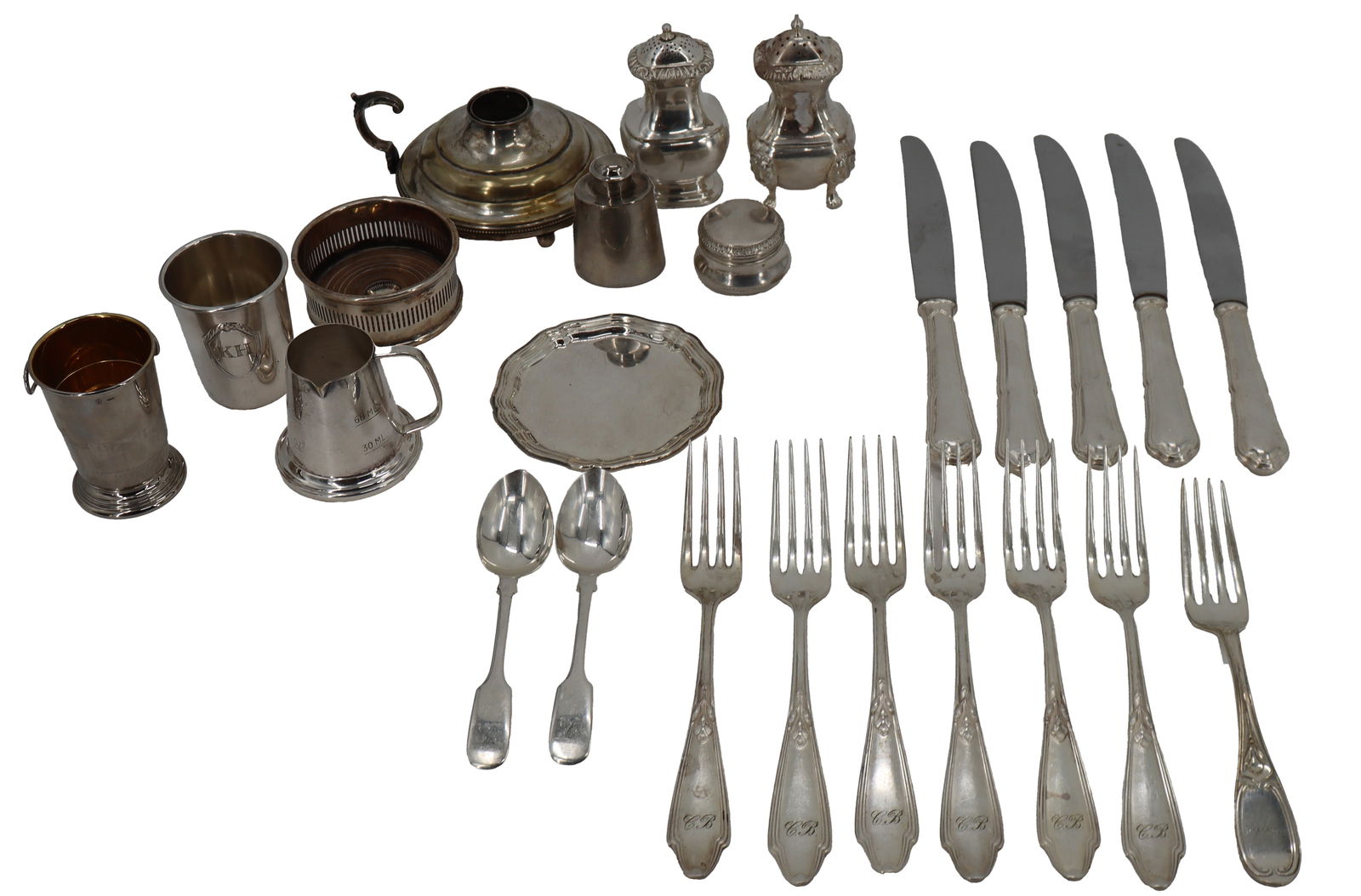Group of 24 Silver Plated Utensils and Table Accessories: Group of 24 Silver Plated Utensils and Table Accessories. 5 knives. 7 forks. 2 spoons. 1 plate. 3 cups. 1 coaster. 3 shakers. 1 lidded vessel. 1 oil holder. Longest: 10 in. #806